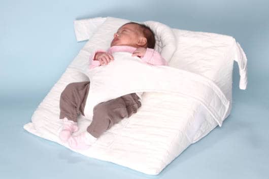 o travesseiro anti refluxo pode contar com proteção para o bebê não virar